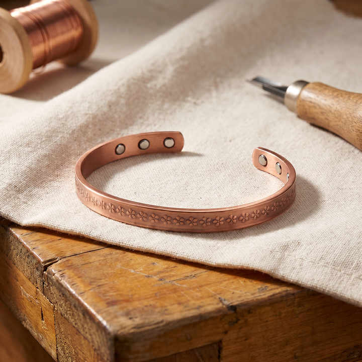 Loch | Flower-Stamped Copper Bangle